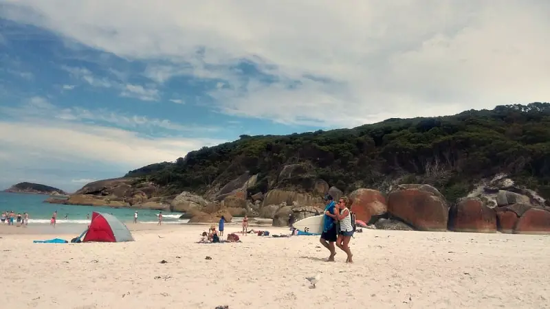Surfers and beach tents at Squeaky Beach Wilsons Promontory.