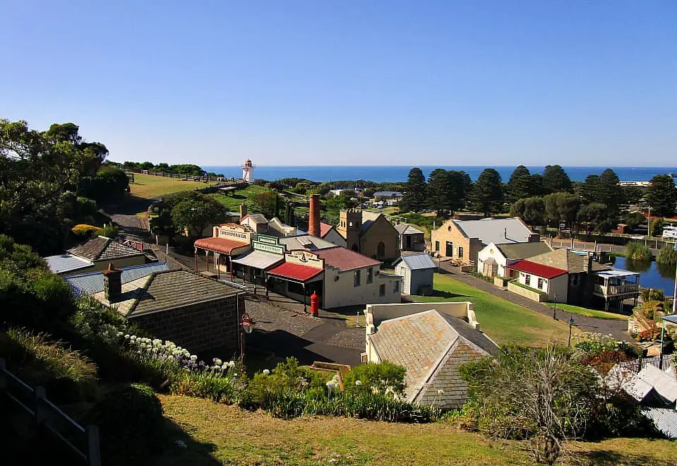Overview of Flagstaff Hill buildings with the bright blue sky and the ocean in the background. One of the must-do things to do in Warrnambool.