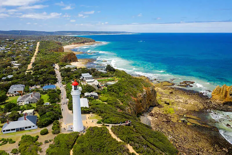 Aerial view of Split Point Lighthouse and Aireys Inlet a town on the Great Ocean Road.