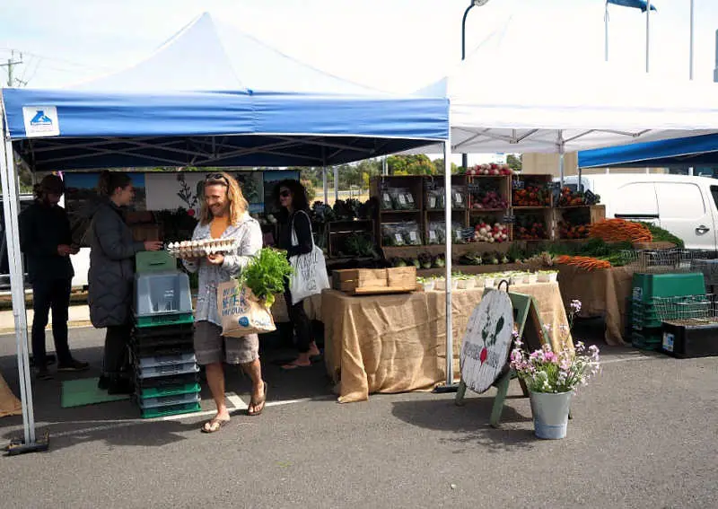 Man buying fresh produce at one of the Torquay markets.