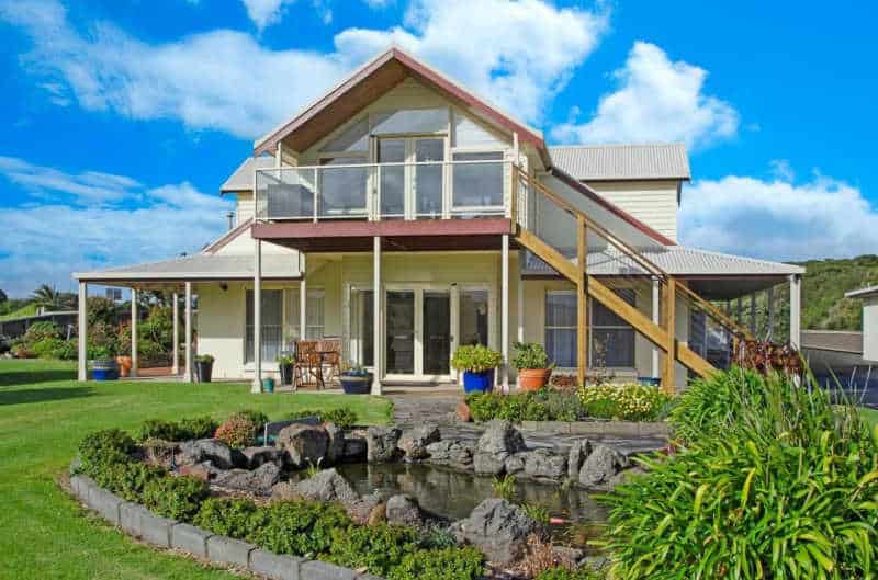 View of Logans Beach House and Apartments and front garden.