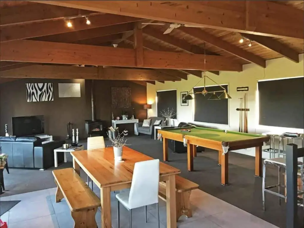 Games room with pool table at Sandy Point Luxury Beach House.