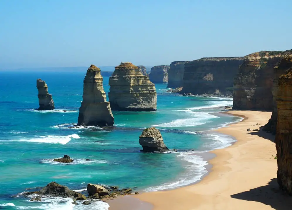 The Twelve Apostles rock stacks and beach at Port Campbell National Park. A scenic flight that takes in the 12 Apostles is one of the incredible things to do in Ocean Grove.