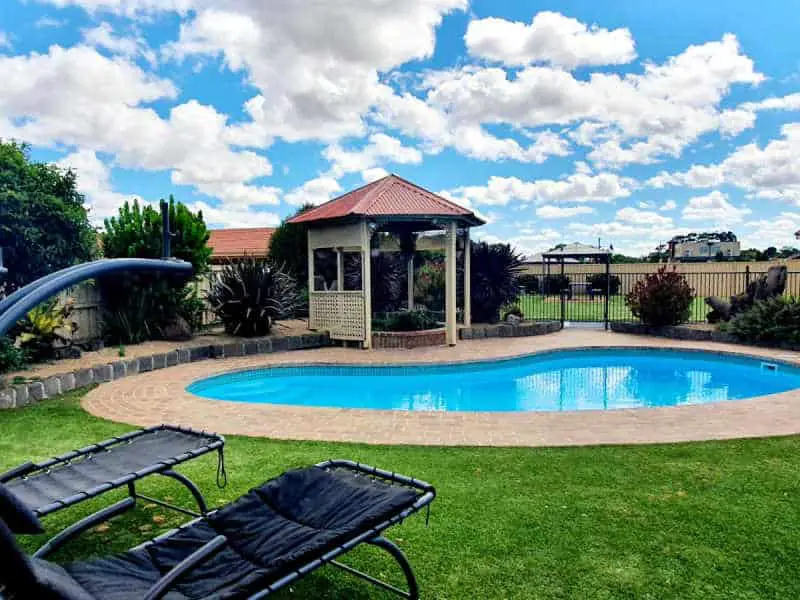 Pool area with cabana at Werribee Park Motor Inn a motel in Werribee Victoria.