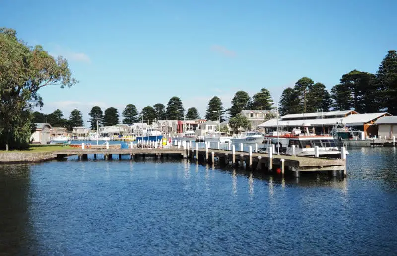 Pier and boats at Port Fairy Harbour on the Moyne River. One of the great places to visit in Port Fairy Vic.