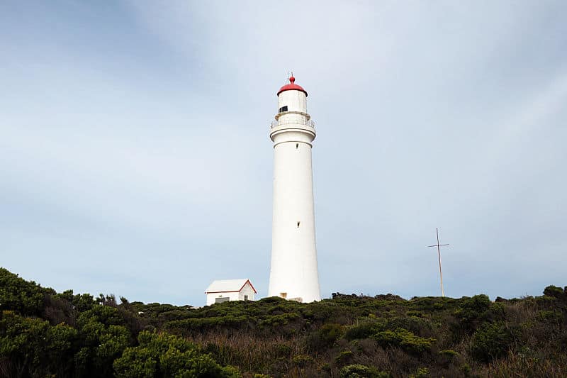 View of Cape Nelson Lighthouse with outbuilding.