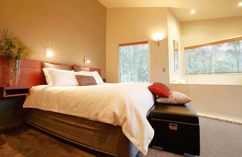 Guest bedroom with spa bath and Ironstone Romantic Couples Retreat 