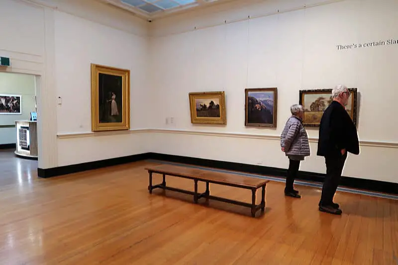 People admiring the artworks at Castlemaine Art Gallery Museum.