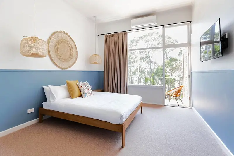 Guest room with balcony at Lorne Hotel accommodation.