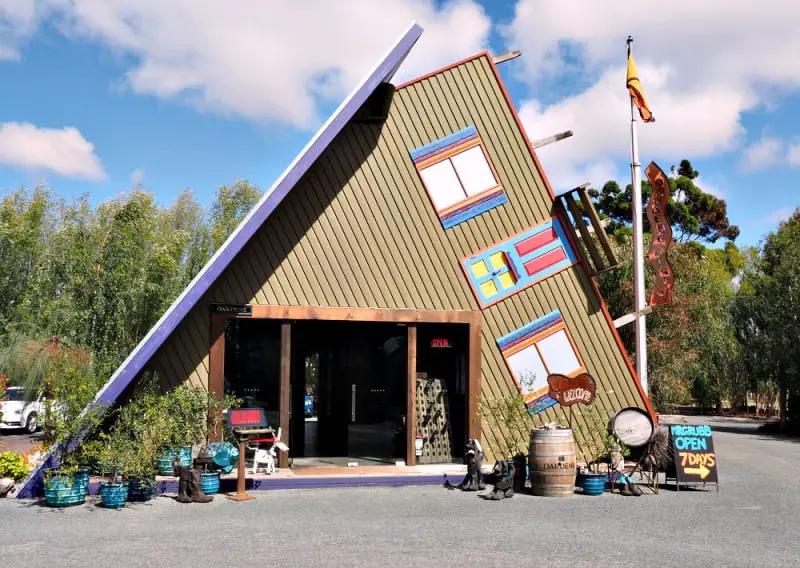 The cellar door at Oakdene Winery looks like a house that has been blown over in the wind. One of the popular Ocean Grove attractions.