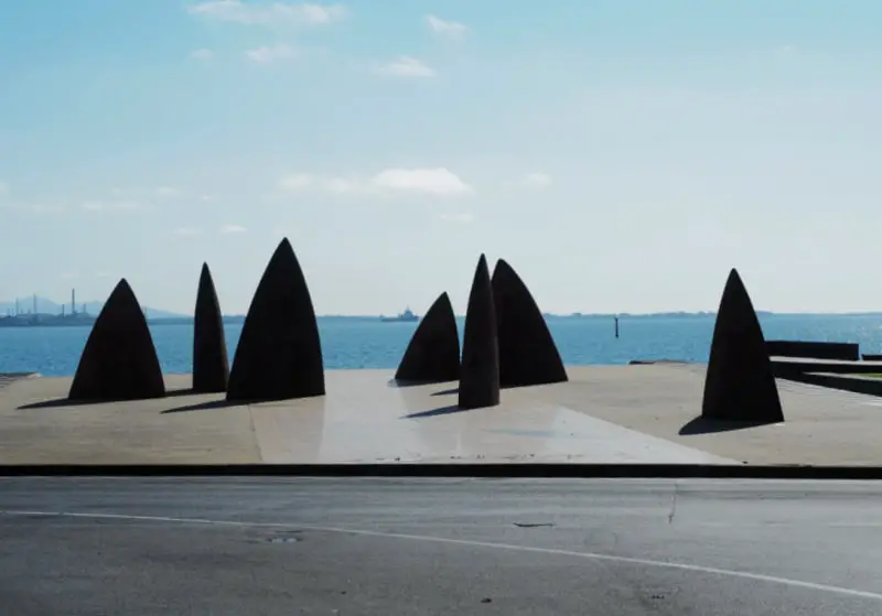 Geelong public artwork sculpture "North" with Corio Bay in the background.
