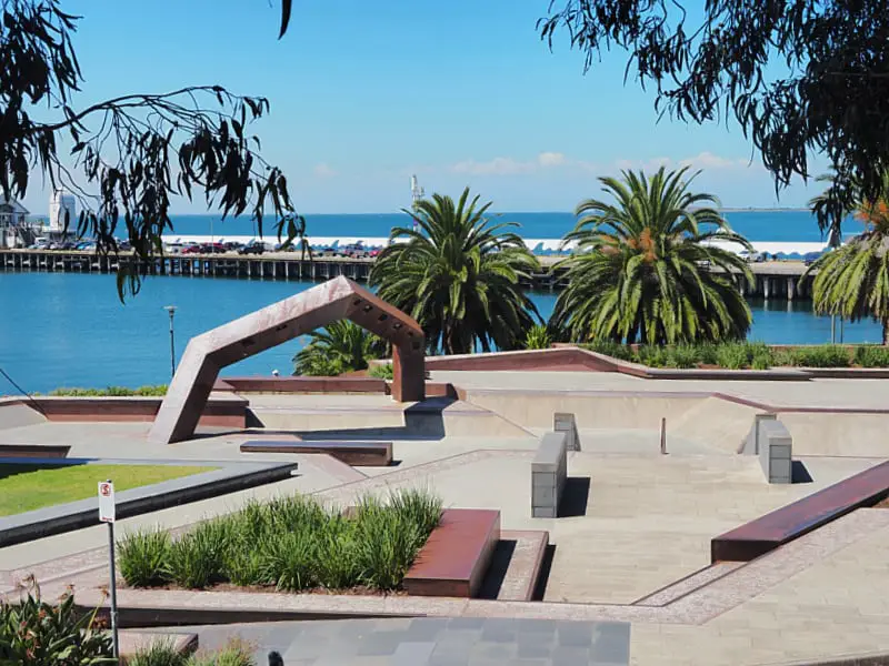 Geelong waterfront skate park with Cunningham Pier and palm trees in the background.